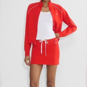 NWT Aritzia TNA offseason micro skirt red in size SMALL